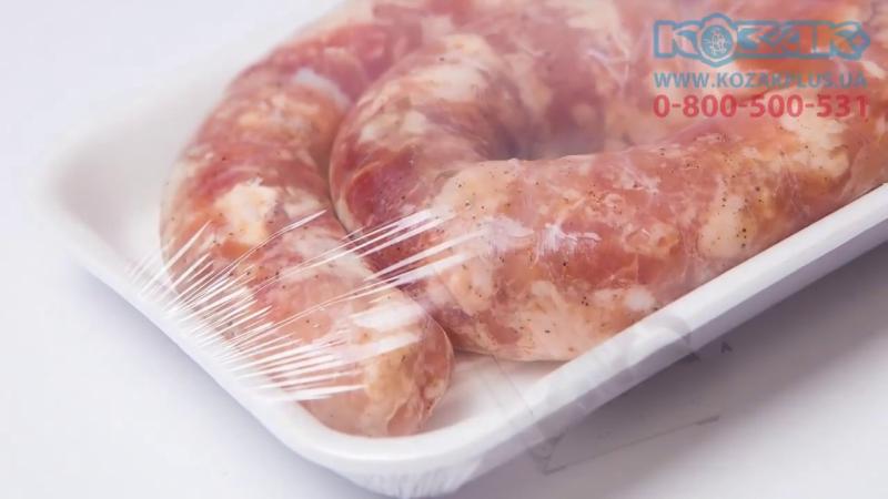 Пакування стретч плівкою продуктів в тарілко-піддонах (харчових лотках)