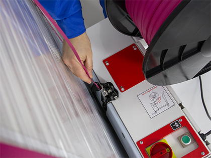Місце зварювання та обрізки стрічки